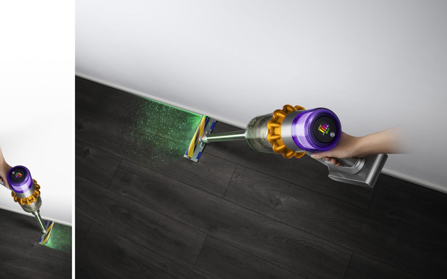 Hand holding the Dyson V15 Detect Slim vacuum
